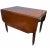 Classic Sheraton New England drop leaf table: Thick reeded legs with turned detail, terminating in brass casters. Single...