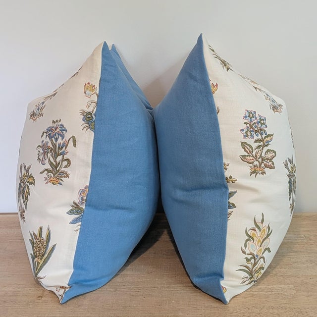 Elizabeth Eakins Attur is a pretty botanical floral in 100% linen. Coordinating blue linen backs, invisible zippers and...