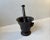 Finely proportioned, medium sized cast iron mortar and pestle. With its original finish and excellent patina. Nice and...