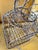 This is a unique and ornate vintage metal birdcage. Hinged door on front which has a metal closure. The top is also easily...