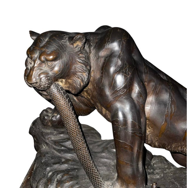 A masterfully cast Japanese bronze sculpture by the celebrated Meiji period artist Genryusai Seiya (1848–1916), depicting...