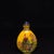 This is a finely crafted antique glass snuff bottle, featuring a hand-painted enamel design on a bright yellow ground. The...