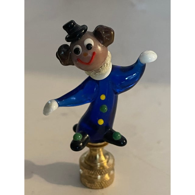 Pair of dancing clowns Bohemian art glass figurines on brass bases as lamp finials.