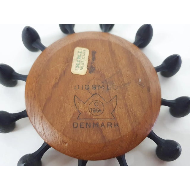 A nice candleholder by Danish manufacturer Digsmed, famous for their teak herb wheel. Digsmed was a manufacturer of many...