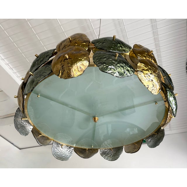 Chandelier ceiling pendant light lamp flush mount in brass and Murano glass water lily nenuphar. Contemporary work from a...