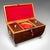 This is an antique sarcophagus tea caddy. An English, rosewood loose leaf tea case dating to the William IV period, circa...