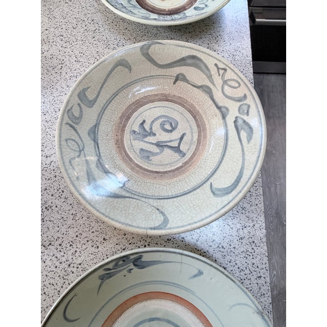 Description An exceptional and rare curated collection of five (5) large antique Chinese trade porcelain chargers...