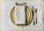 Eight is the number that means it. Four napkins is a dinner party. Eight is a household that took the table seriously —...