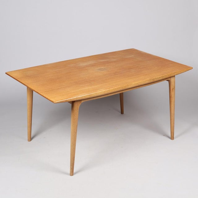 Dining table model 371 in oak with two additional plates. Designed by Alfred Christensen and executed at Slagelse...