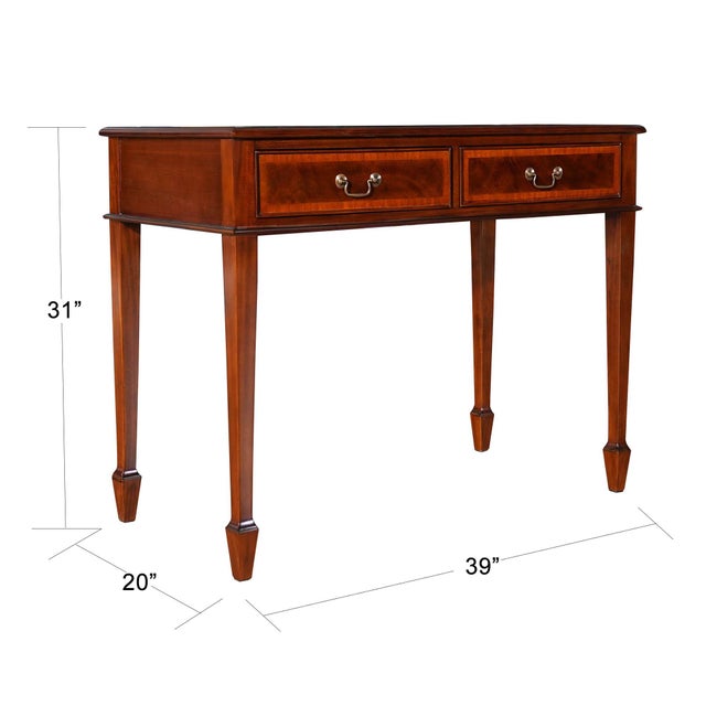 A high quality Small Mahogany Banded Desk from Niagara Furniture made of mahogany and satinwood with solid brass drawer...
