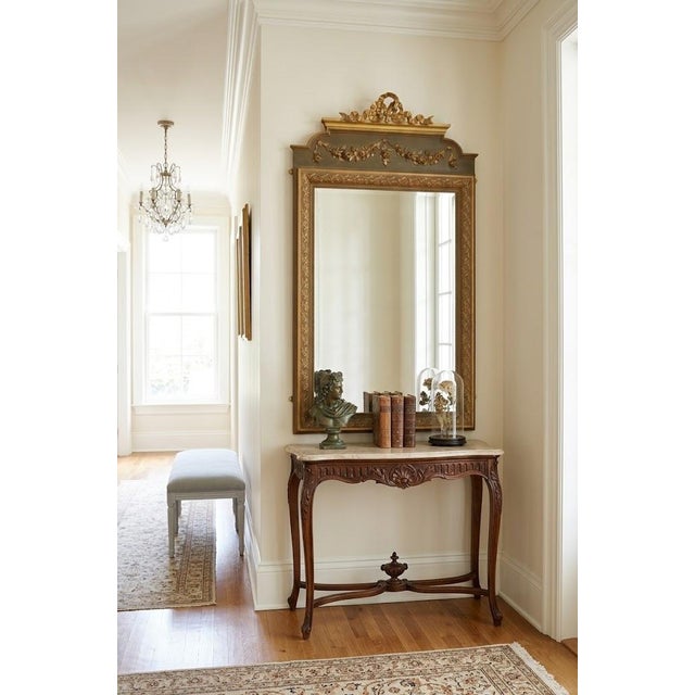 P0234 a slim and remarkably charming french belle époque wall mirror, dating to circa 1900. This fine antique pier-style...