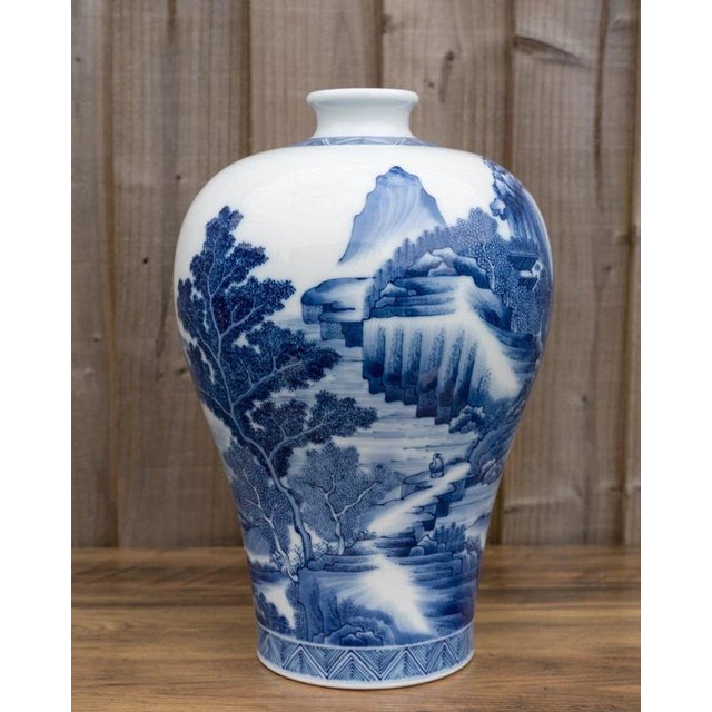 A beautifully proportioned Chinese blue and white porcelain Meiping vase, hand-painted in the Kangxi style and dating to...