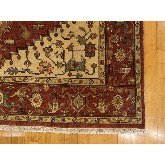 Rustic Serapi Hand-Knotted Wool Rust Field With Geometric Medallion Rug For Sale - Image 9 of 10
