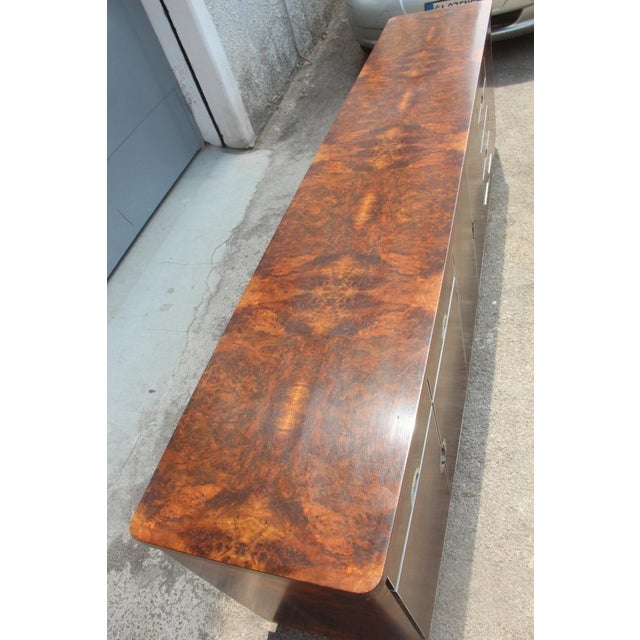 Walnut Burl and Brass Sideboard by Carlo Torriggiani, 1970, in Very Good conditions. Designed 1970 to 1979 This piece is...