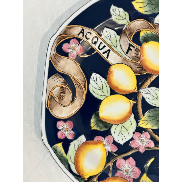 This striking and vibrant colorful vintage Majolica Acqua Fa Cedra Platter Designed with Raised Lemons, Flower and Leaves...