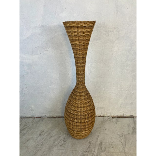 This enormous vase is wicker! It’s the size of a floor lamp! Very chic, great condition!