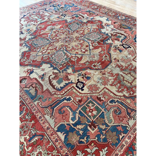 Late 19th-century Heriz/Serapi rugs represent a pinnacle of artistic achievement in Persian carpet weaving. Originating...