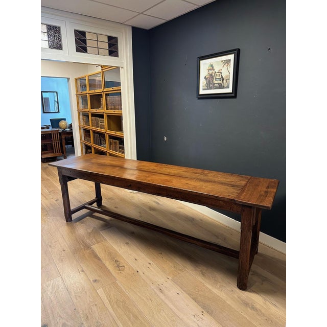 Beautiful, weathered 18th-century antique French table. The table is made of cherry (top) and oak (base), a style often...