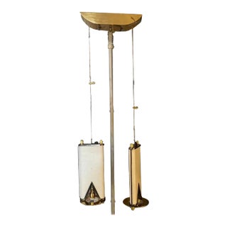 An Elegant 1980s Mid-Century Modern Brass and Skin Italian Double Chandelier For Sale