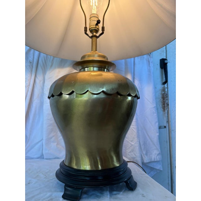 MCM Urn Style Brass Lamp With Champagne Softback Bell Lamp Shade. Lamp also Features Scalloped Trim at the Top and lamp...
