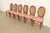 A gorgeous set of six French Regency Louis XVI style dining chairs By Drexel USA, Circa 1960s Carved walnut frames, with...