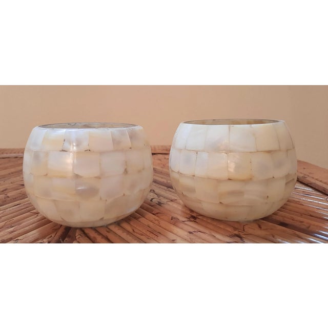 Shell mosaic candle tea light holders feature a round ball or globe design that showcases exquisite craftsmanship. Made...
