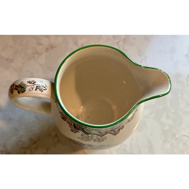 Add classic English elegance to your collection with this **Vintage MCM Copeland Spode Byron Pitcher**. Beautifully...