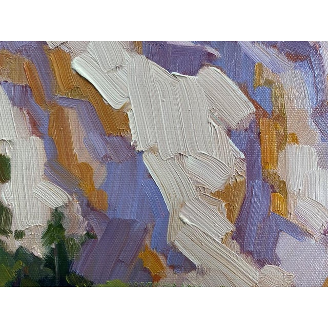 This work is titled "Water on the Rocks". Susan F Greaves' work is described as "a fine example of strong, painterly...
