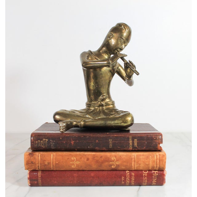 Vintage solid brass Thai musician snake charmer figurine. No makers mark. Weighs 2lbs 11oz. Minor age wear. Patina.