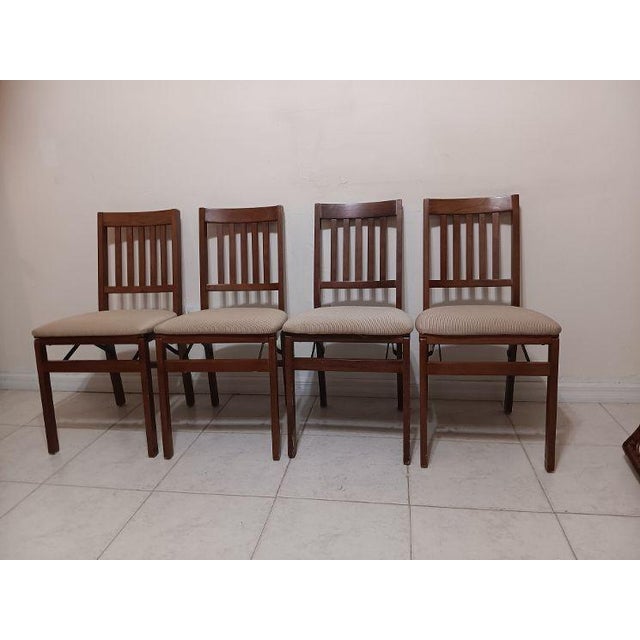 Stakmore wooden folding card table set with four matching slat-back chairs featuring padded Fabric seats Style:...