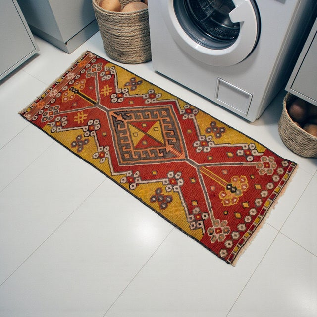 This vintage flat-weave kilim radiates an authentic, earthy charm that effortlessly grounds any modern space. Crafted with...