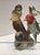 Vintage Enesco Japan ceramic figurine featuring a detailed woodpecker bird family perched on a tree trunk with floral...