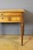 A Directoire period gentleman's dressing table in cherry wood, opening with three drawers and a drop-front revealing a...