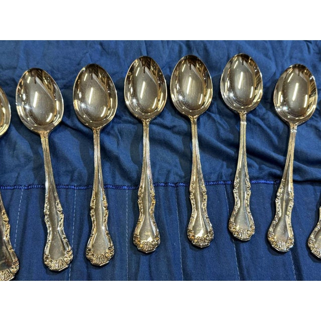 Set of 12 large Mappin and Webb silver-plated spoons, Russell pattern - L=21cm This piece has an attribution mark, I am...