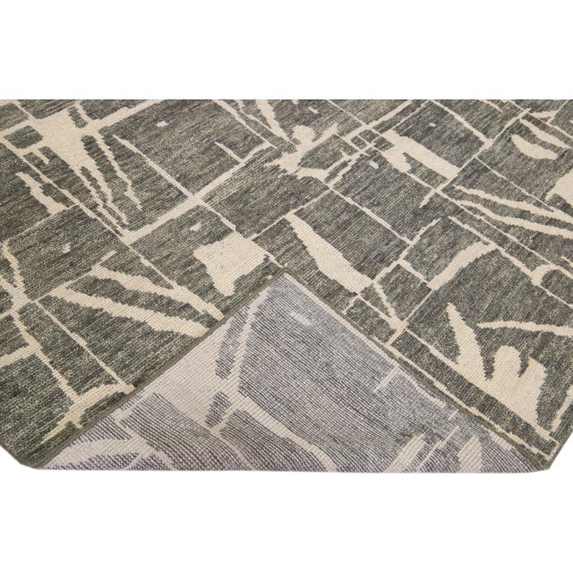 Beautiful Contemporary Thom Filicia Home Collection Rugs. This Indian hand-knotted rug is made of wool and has a green-...