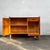 This mid-century modern sideboard cabinet is a notable piece of czechoslovakian design, created by the regarded designer...