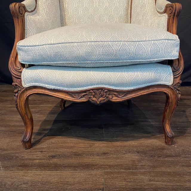 French Classic French Louis XV Intricately Carved Walnut Wing Chair For Sale - Image 3 of 14