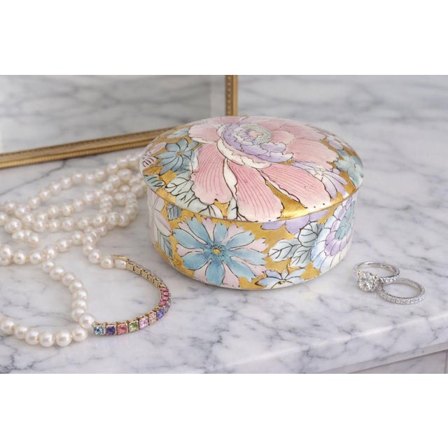 Offering a beautiful hand painted 1970's Golden Peony Chinese porcelain trinket or jewelry box made by Toyo, signed and...