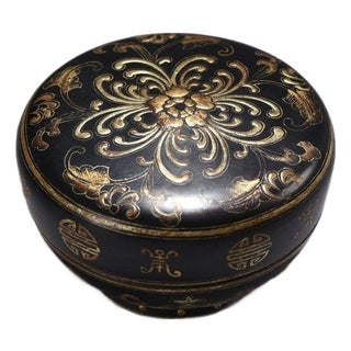 Vintage Gilt Black Lacquer Round Trinket Box With Floral Motif For Sale