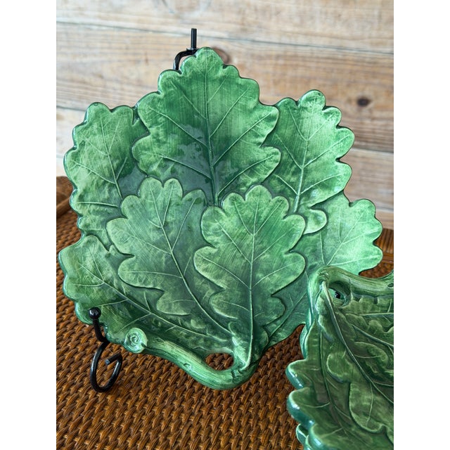 A charming set of four Vietri Foglia Fresca majolica plates featuring the distinctive layered leaf design in rich...