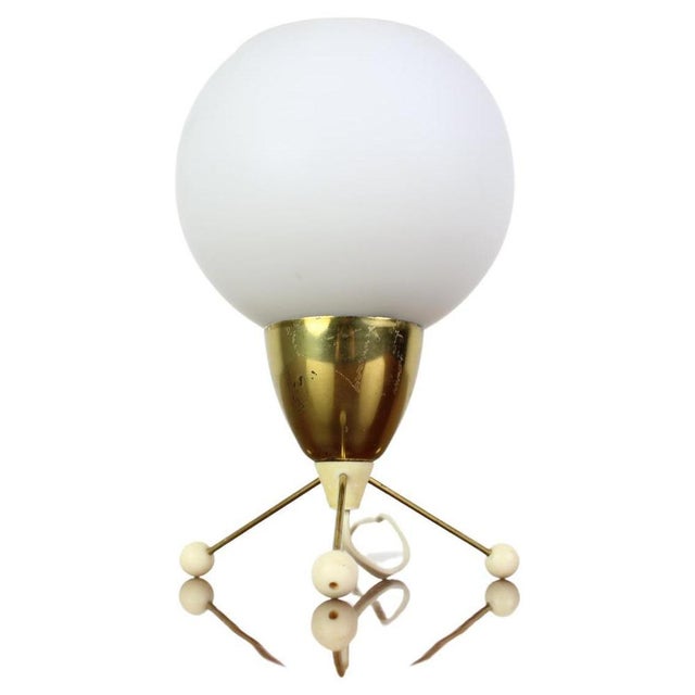 Brass and plastic base. Good original condition. Rewired: 1 x 40w e12-e14 bulb us plug adapter included. up to 250v...