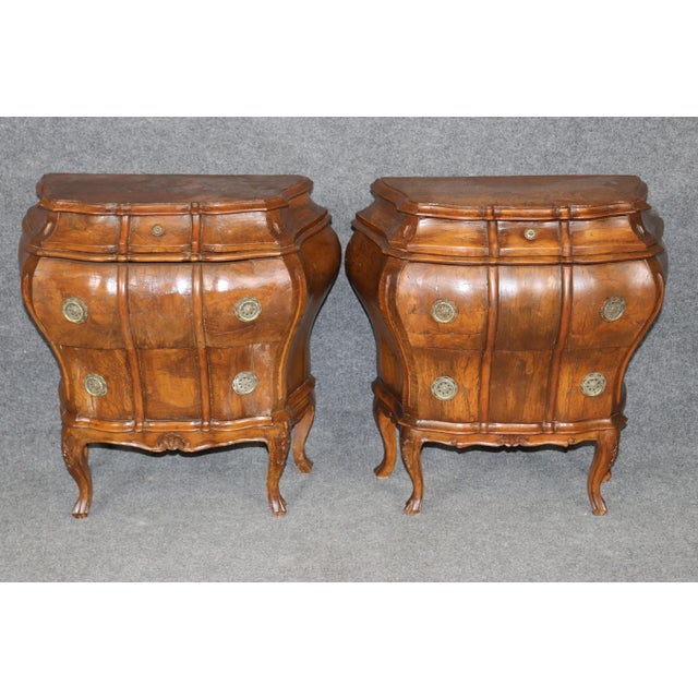 Dimensions: 26 1/2 inches high x 26 1/4 inches wide x 12 inches deep A striking pair of antique Italian Baroque style...