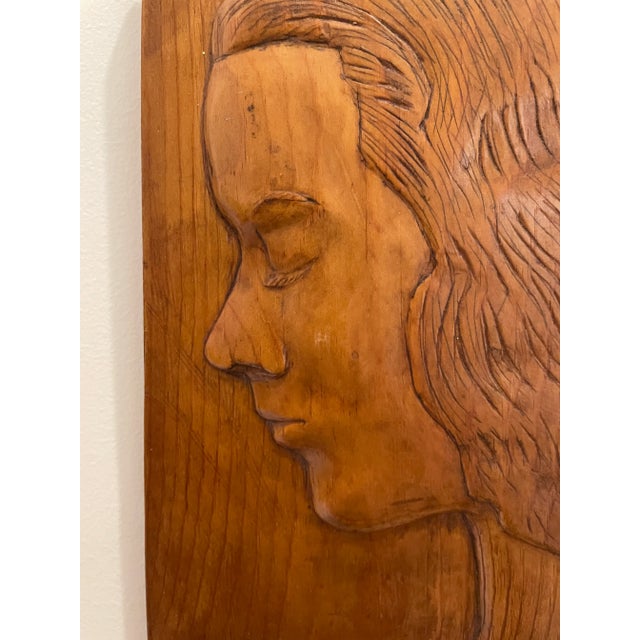 1940s wood carving of a lady in profile. Found in Virginia, it's probably cherry. Unsigned, wired for hanging. Combined...