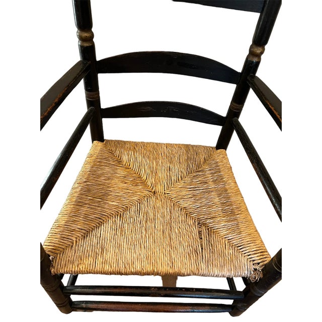 Wood 18th Century Ladder-Back Chairs with Curve-Top Slat-Back, Black Paint With Gold Colored Accents, Rush Seat, Hand-Turned Finials and Mushroom Handholds For Sale - Image 7 of 12