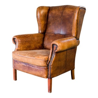 1970s Vintage Art Deco Distressed Leather Wingback Chair For Sale