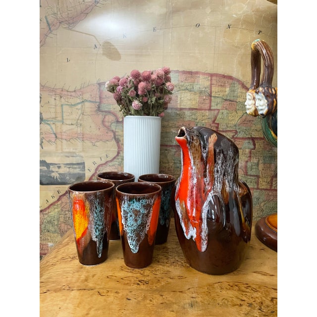 Gorgeous Vallauris handmade ceramic set. Bird shaped pitcher with four drinking glasses – brown glaze with white orange...