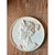 This vintage circular bas-relief medallion presents a classical profile portrait rendered in the Neoclassical tradition,...