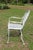 Wrought Iron Patio Set—Four Armchairs and a Table With a Glass Top For Sale - Image 4 of 18