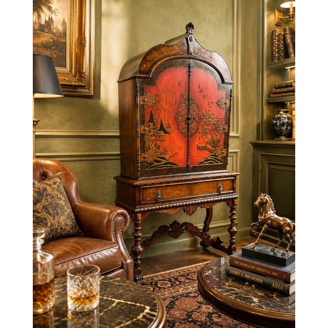 This Berkey and Gay china cabinet dates to the 1930's. It features applied embellishments and carvings. The double doors...