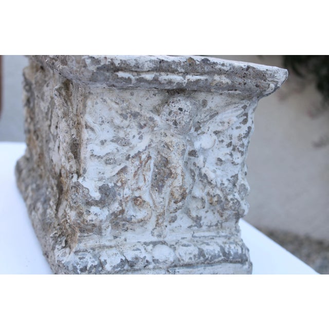 Late 19th Century cast stone garden planter with delicate cherub relief. Found in the French countryside. Time worn...